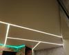 02.10.2020 - Натяжной потолок со световыми линиями и парящей подсветкой на стене с кирпичиками