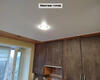 28.04.2023 - Натяжные потолки в студии с высокими шкафом и кухонным гарнитуром - Фото №5