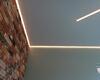 30.05.2022 - Парящий натяжной потолок со световыми линиями и скрытым карнизом - установка в кухне-гостиной - Фото №3